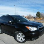 Black SUV angled front with roof rails