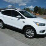 Front three-quarter view of white crossover