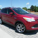 Red Ford Escape front three-quarter view