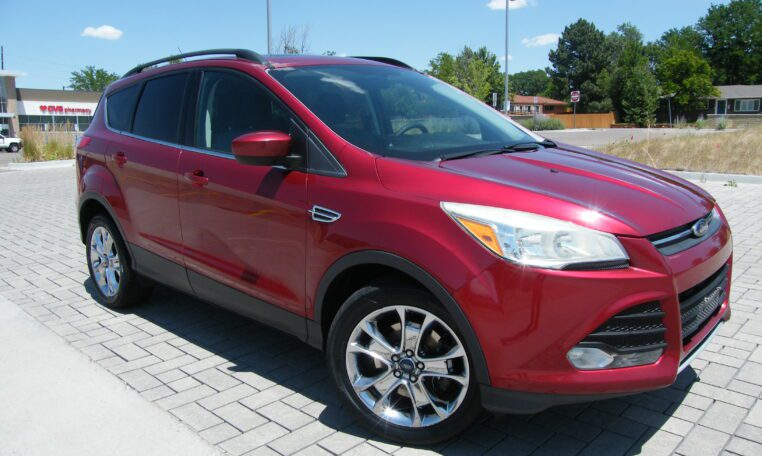 Red Ford Escape front three-quarter view